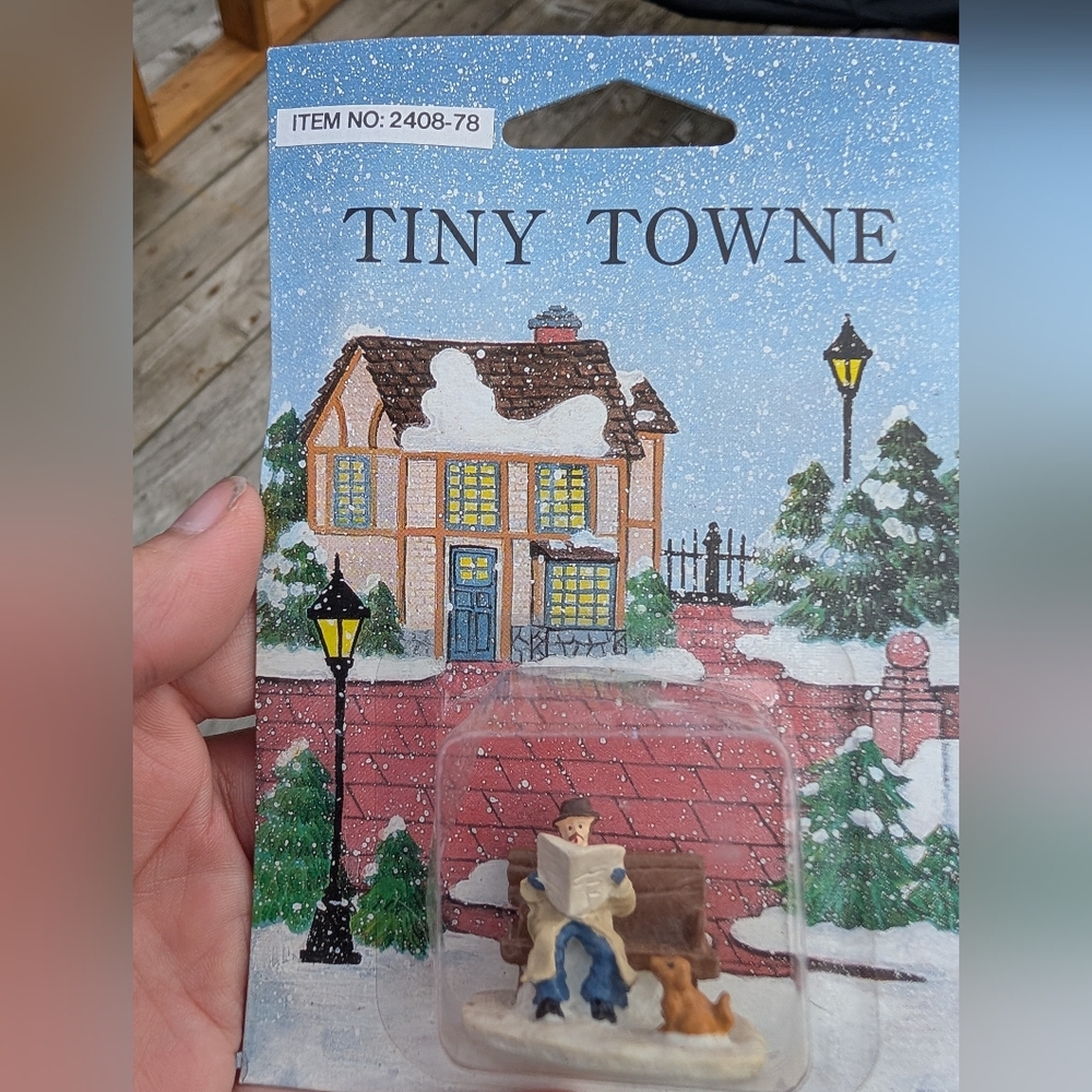 2/16$ Tiny Towne Figurine with Newspaper And Dog